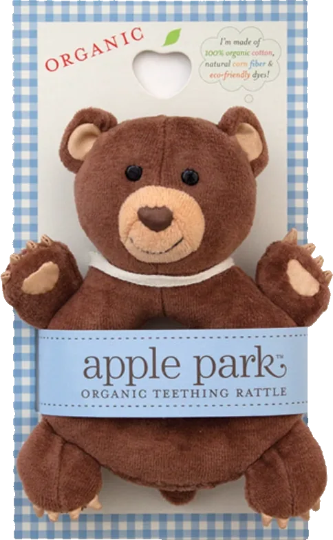 Cubby the bear teething rattle on a blue gingham backcard with a heart-shaped hang hole and an apple park band.