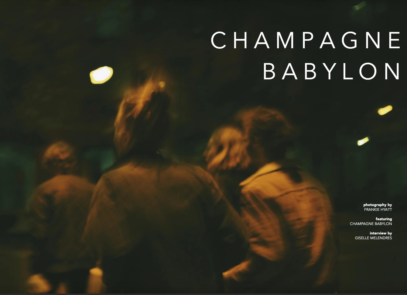 The Champagne Babylon opening spread for Mad Sounds Magazine: the band walking away through a blur of warm night lights.