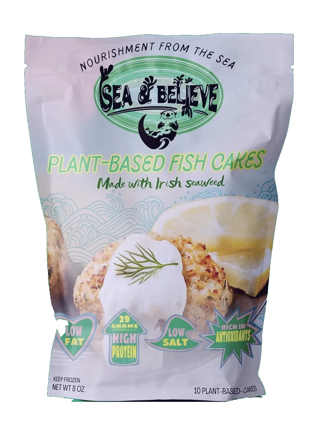 The Sea & Believe plant-based fish cakes pouch, showing two golden fish cakes with dill and a lemon wedge.