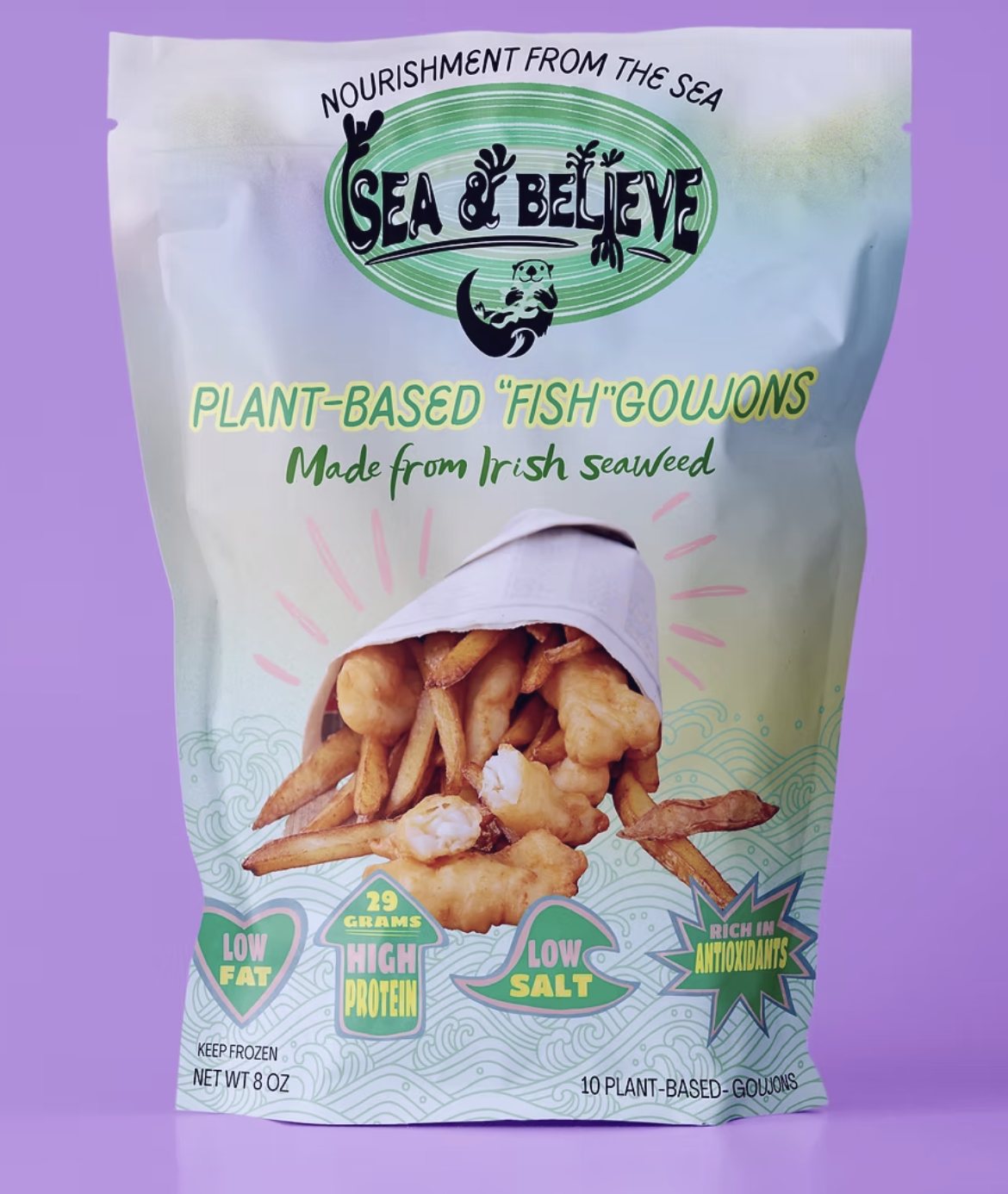Sea & Believe plant-based goujons pouch on a lavender ground, with goujons in a paper wrap.
