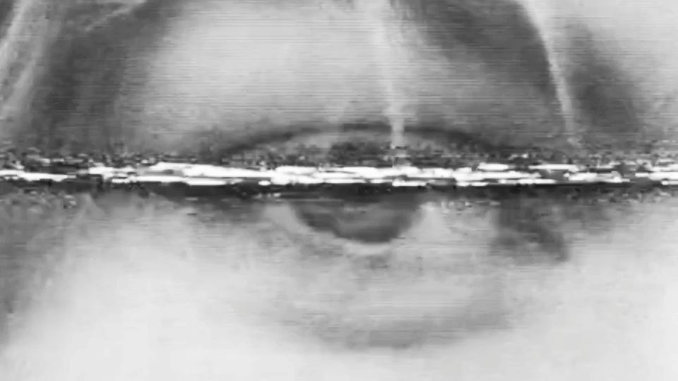 An extreme close-up of an eye in black and white, from an editing study.